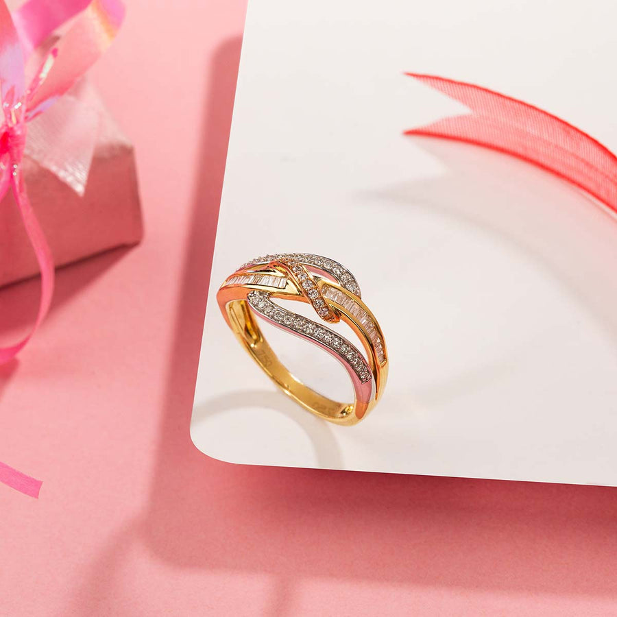 Gold ring with diamonds set in a crisscross pattern