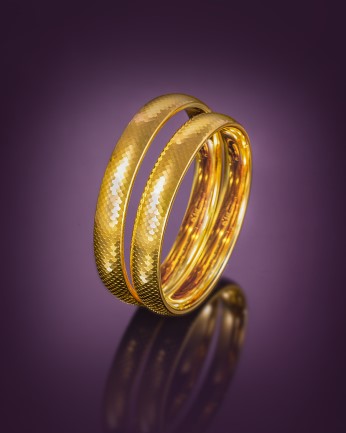 Shine Bright with 24 Carat Bangles: Discover HANIF's Exquisite Collection Today!